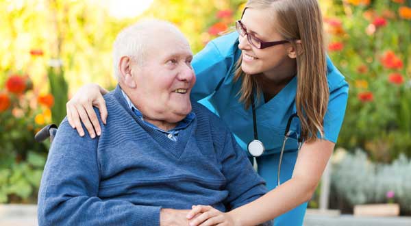 Home Health Nurse with Elderly Man